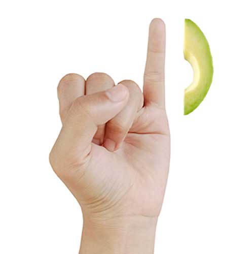 White hand holding up pinky finger next to single slice of avocado.