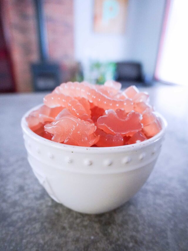white glass bowl filled with strawberry lemonade homemade fruit gummies
