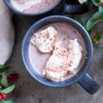 Cup of nourishing raw milk hot chocolate with homemade marshmallows.