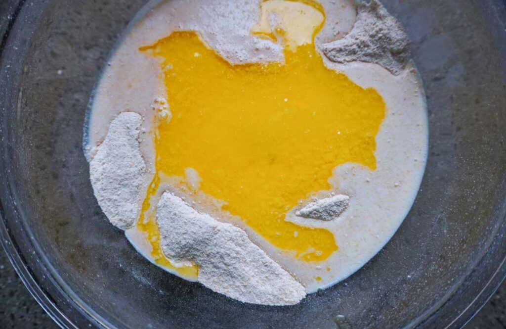Pancake batter in a large bowl prior to mixing together