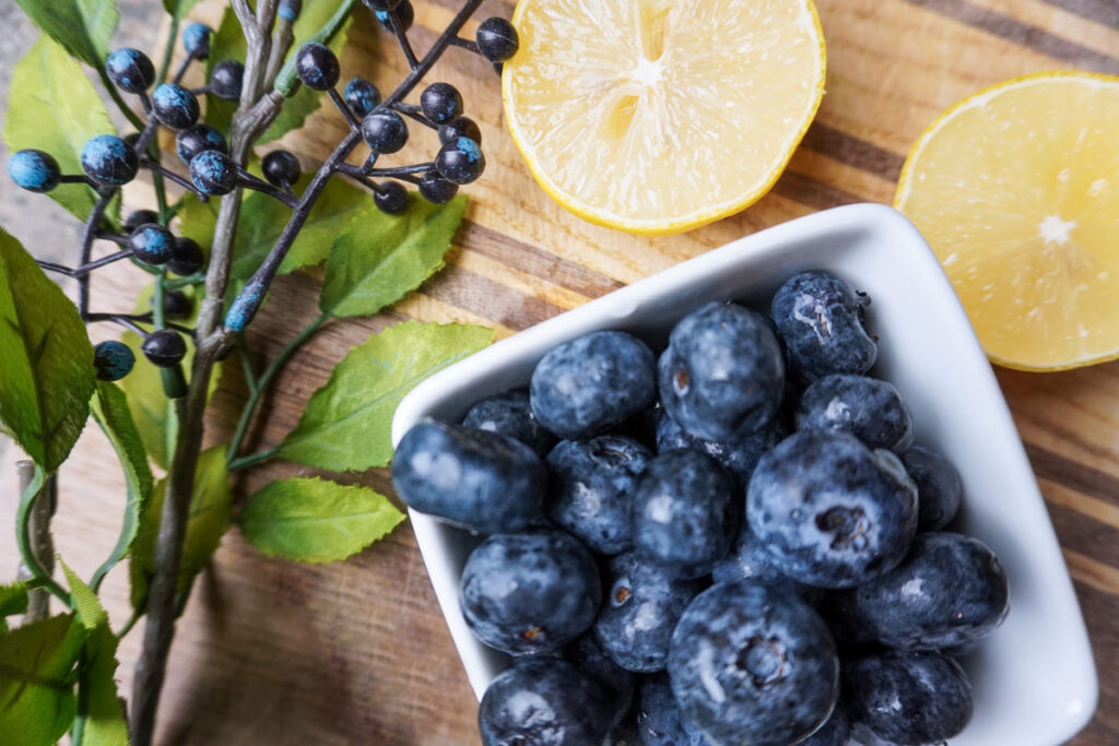 image of fresh juicy blueberries and lemon slices