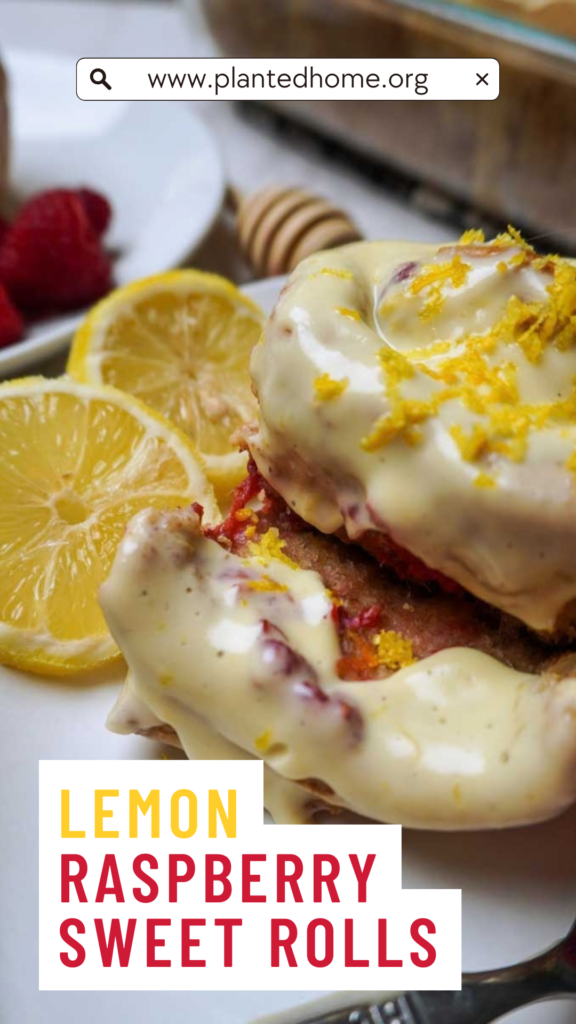 Close up image of a lemon raspberry sweet roll with fresh milled flour and text "lemon raspberry sweet rolls"